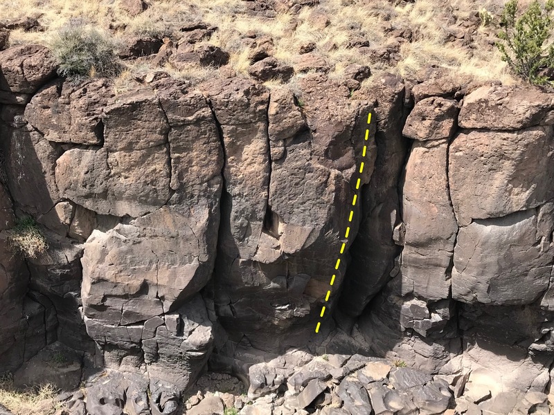 Shady overhanging crack right of cyclops eye. Cyclops R is the left of two cracks in a wide stembox.