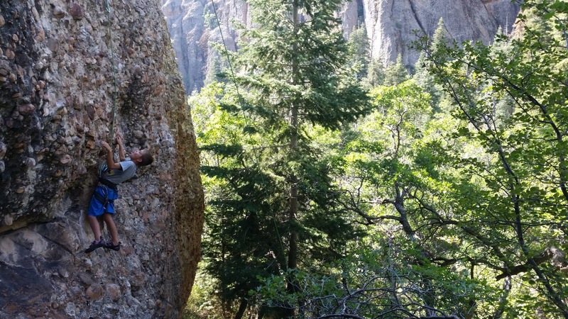 Knox enjoying a nice stance before the crux of Mr Good Jugs at the Mini Max, Maple Canyon.