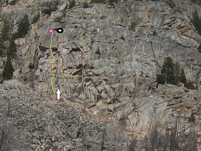 Follow top to bottom crack line, right of Ta'Tonka (Black-white arrow)