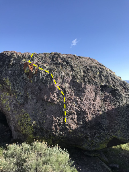 starts in the middle on small holds, and makes it's way to the white tipped rock at the top.