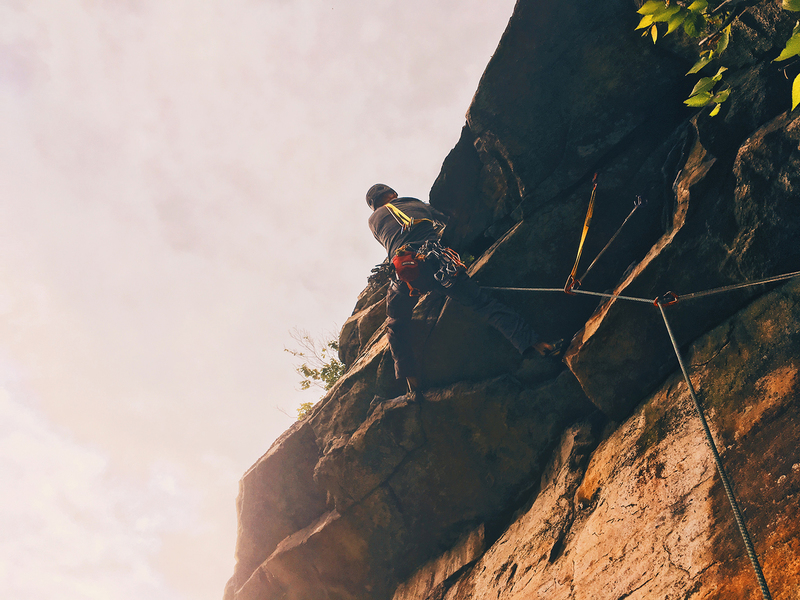 Andrew Kontola pulling the final roof move on Ape Call. June 2018.