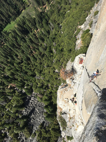 Leading above the Kor roof with a nice view of dinner ledge.