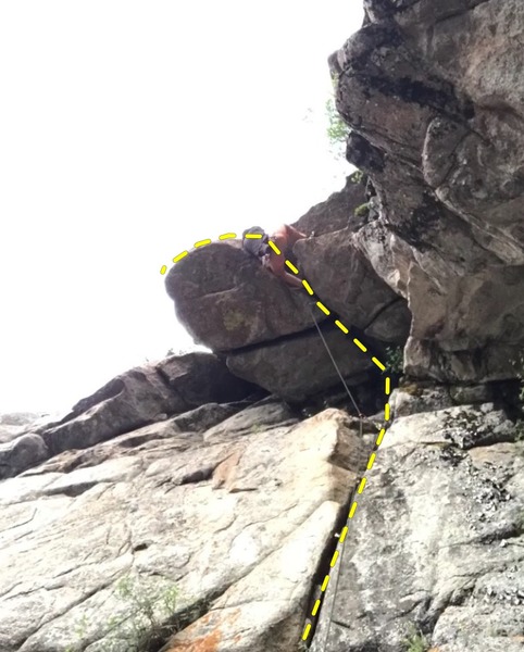 Josh LaMar pulling the crux roof.