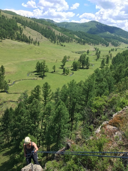 My wife Katie rappelling down after following on the FA.