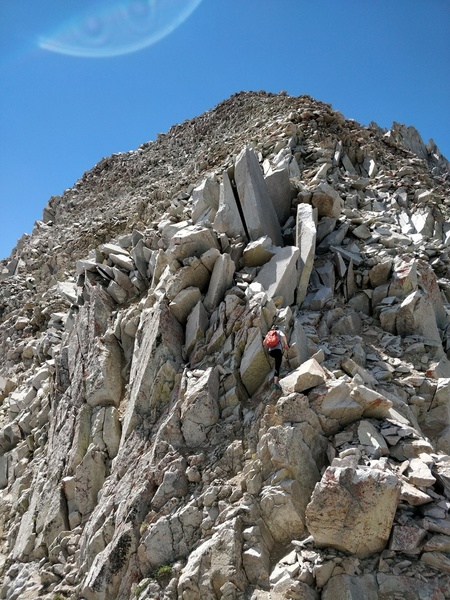 Thought I'd add one summer photo.
<br>
<br>
This is the last couple hundred feet to the summit. Lots of loose rock but mostly low angle enough that it isn't a huge concern at this point. The lower half of the route has much better rock quality