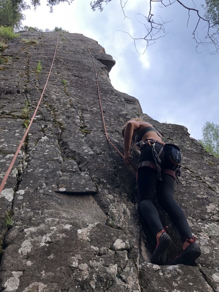 Good view of the line. If you zoom you can see two cam placements. Just after first bolt, get on the arete, and follow all the way up. The second bolt is runout with groundfall potential but easy.