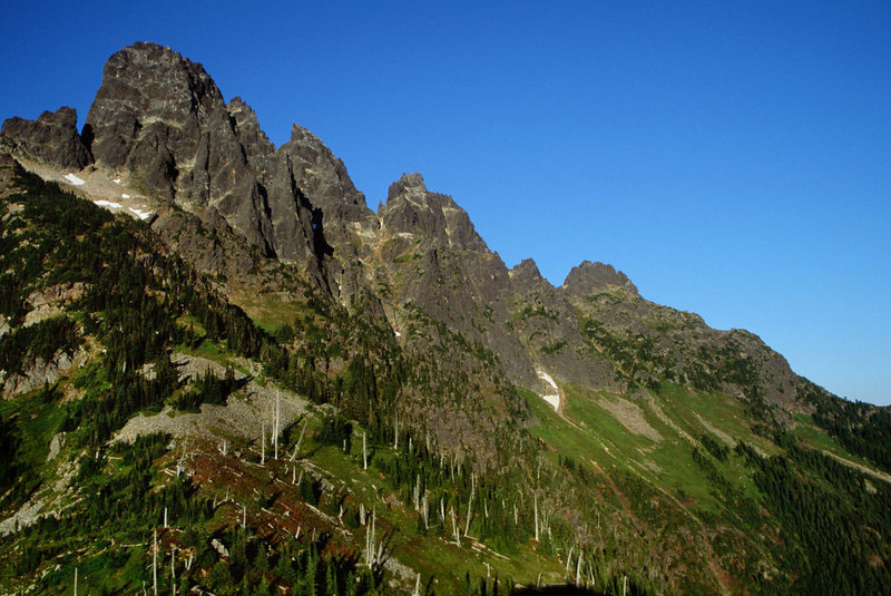Evening south side of Slesse on the old traditional descent - August 2002. Did know much of anything about the Crossover option so played it safe and took the long way home.