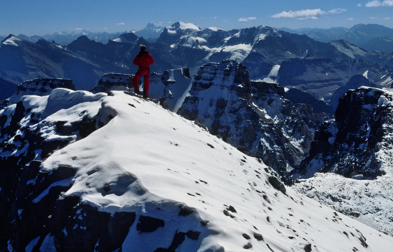 Mark Whiton at the top of Mt Fay - August 1988. Temple and Assiniboine in the far distance.