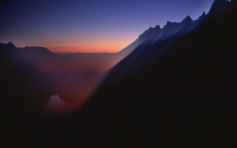 Pre-dawn glow on the approach to the Backbone Arete in August 2004. Very warm night. High 90s down in town.