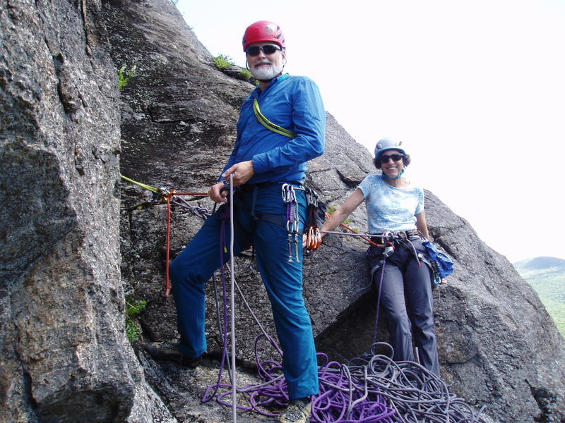 Ralph and Sheila at the belay, end of P1 Right Side Route. Remnant of an old piton in the horizontal behind Ralph. Key piece is a Red (#1) Camalot.