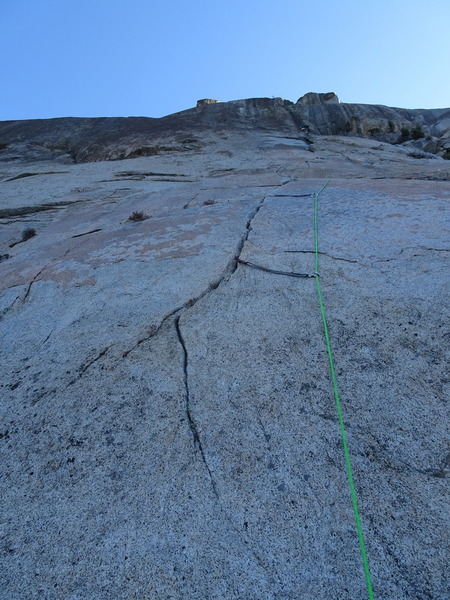 The start of pitch one. Make sure to have a 70m rope if you starting from this crack. For a 60m rope, start farther uphill (to the right).