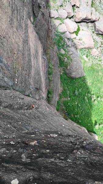 Looking down at Spencer from the P3 anchors. He's at the top of the P2 anchors. It is a tricky rappel... have the first to go clip most of the bolts for whoever goes 2nd.