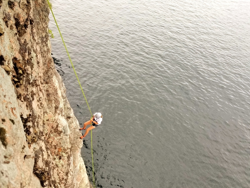Greta rappelling off of Nauti Nana after putting up a successful FFA. One very proud 12-year old.