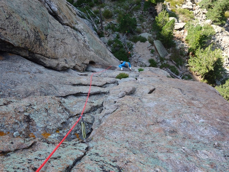 Looking down. The climber is at the belay ledge at the typical end of