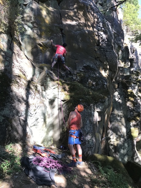 9+ its pretty much straight up-- the start is spicy - and about 10' up moving up the bolt line challenging- if you can't make the moves you can traverse left then over- the top is the crux.