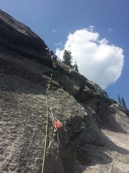 leading up the dirty ramp on the final pitch. (The anchor pictured is next to the standard route 100 ft from the top.)