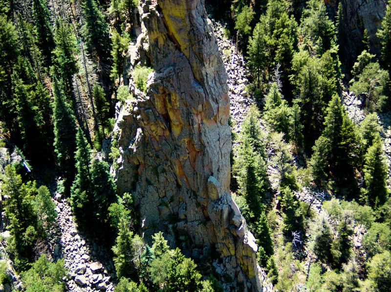 A team of climbers on Rocky Racoon (Leader in alcove, follower near the bottom).