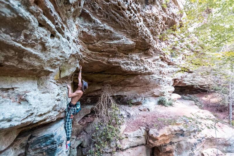 Jon starting the 11a section of the climb. 5.9 anchors right by his waist.