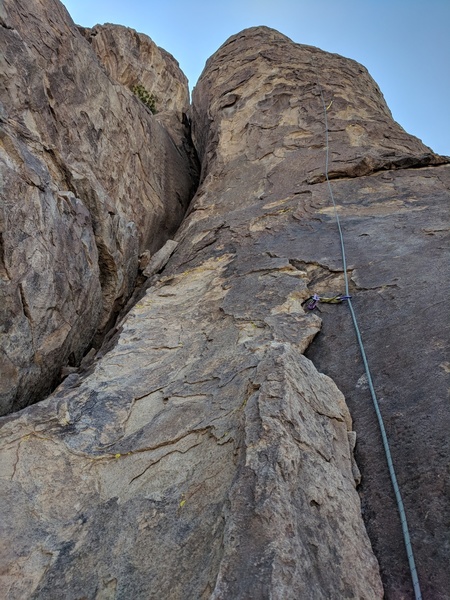 Looking up at the buttress from the route start (top of Alice in Bananaland)