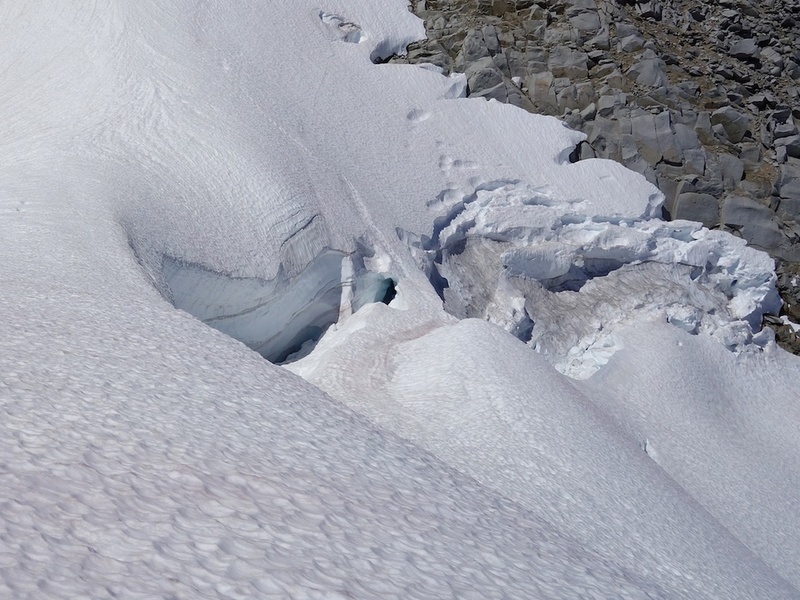 Bergschrund and key snowbridge crossing to get onto the Chickamin Glacier if approaching from the west.