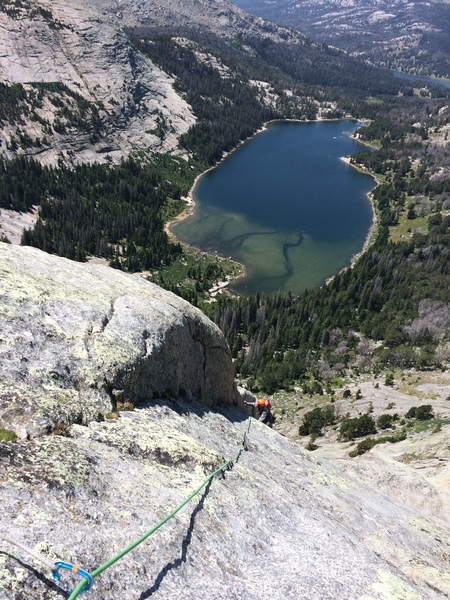 Chris pulls up the incredible moderate corner on P5 to top out the north shoulder.