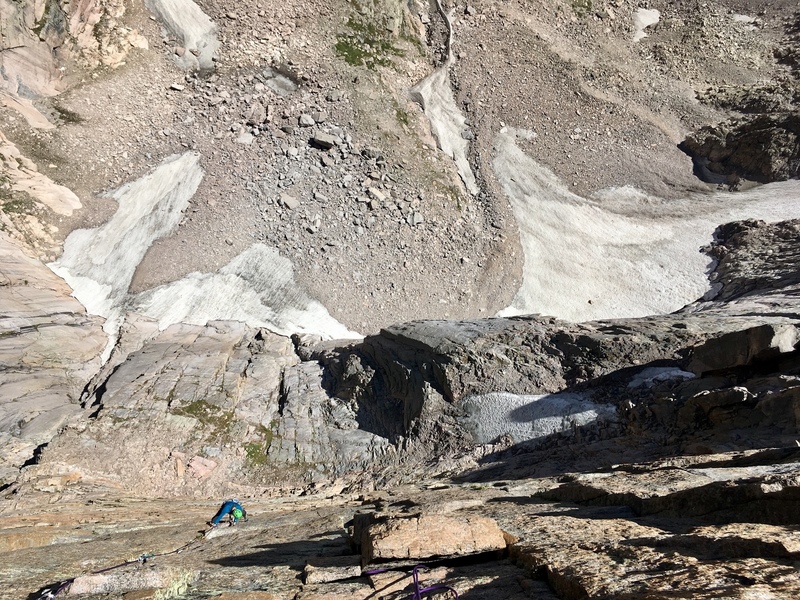 Guy making his way up the crux pitch - he's almost to the midway ledge which some use as an intermediate belay. Save a 0.75 Camalot for the belay to avoid this uncomfortable one off to the side.