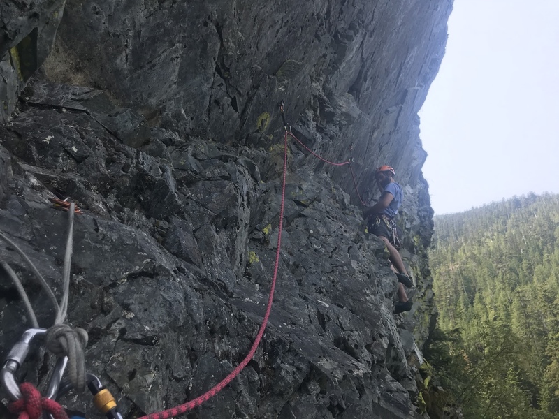 Liam feels the exposure on the P3 traverse! Note the intermediate belay I am at, you cant see it until you’re face to face with it.