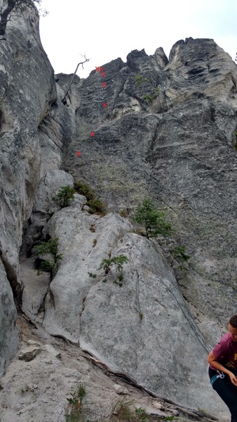 Scramble up the first half and clip the first bolt. 5 bolts total and chains up top.