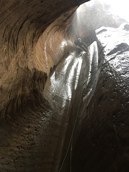 Zion NP, caught canyoneering in the rain, right before the flash.