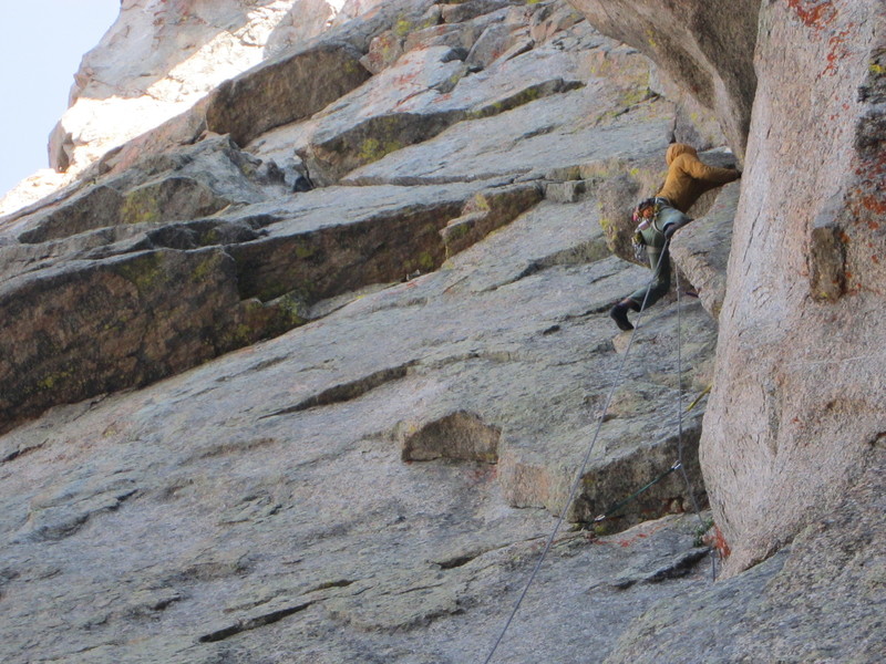 Jake Perkinson cruising through the pitch 1 crux.