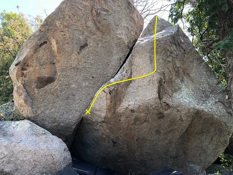 Start as for the mantle problem but instead bust out right, or up the difficulty by only using the right boulder and campus the first few moves.