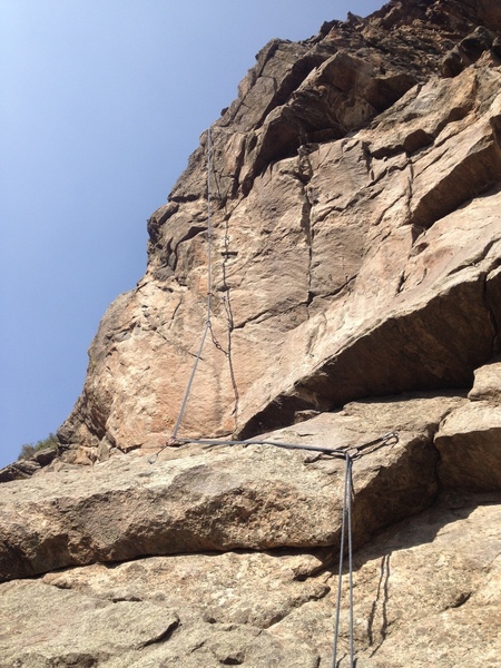A rope on the climb. The first clipped bolt is on another route.