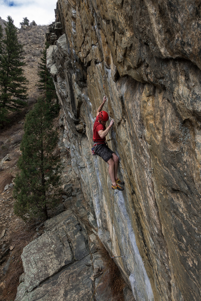 Working out the moves exiting the crux. This whole wall is steeper than it looks from the ground!