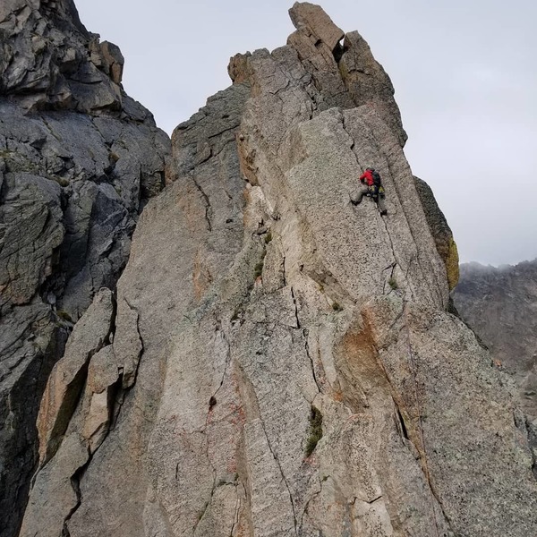 Alex on the hand crack on the third spire.