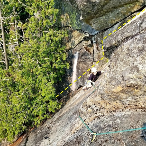 Cooper is climbing Slippter Crack with Nosferatu in the back ground. From the perch, Nosferatu starts in same corner but then continues up while Slippter Crack follows the facial finger crack.