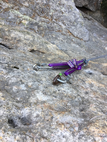 Bolts on the far right of the northeast face (Undercling, Moss Slab, Independence) (photo take from above). Climber's left bolt is pretty rusted.