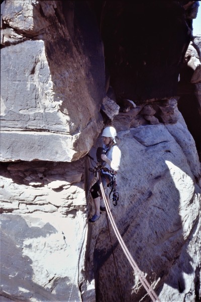 Andy Ross crossing the gap to the North Tower on the First Ascent