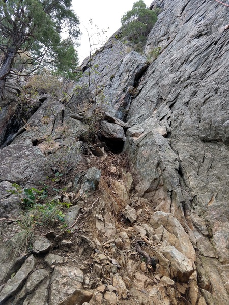This is the gully to the left of irie that you scramble to get to the leftmost climbs. As of Sept 2018, Trenchtown is the single bolted line you encounter after scrambling this gully and following the trail. There are also two trad climbs up by Trenchtown