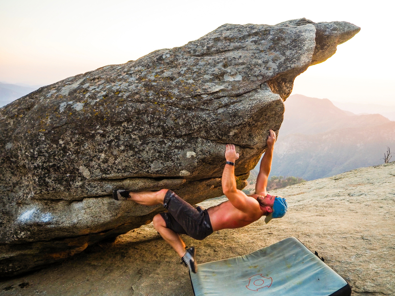 Trevor moves through the crux of the problem.