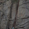 This photo shows the second half of pitch one. The bottom blue mark is the mid-point of pitch one. The blue mark on top marks a comfy belay ledge.