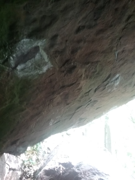Looking out towards the lip. The leftmost chalked hold is not the start. It is the first hold you move to off of the start.