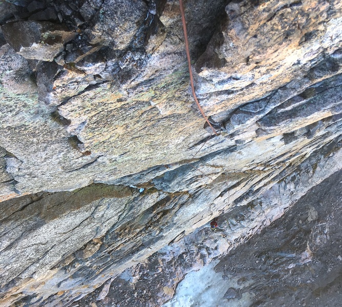 Looking down at the first loose pitch from the start of the mitten dihedral. Note that the belayer is on the ramp above Broadway.