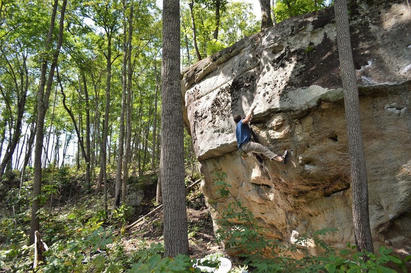 Marshall Gilbert of the 2nd ascent of "Wish You Well" (the start is matched in the long smash jug "smile" at the low right)