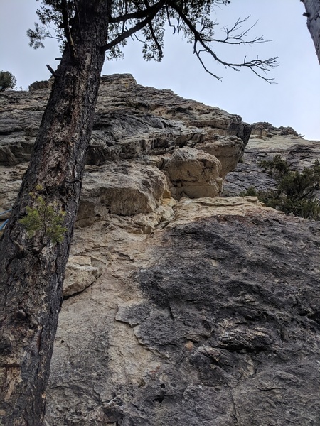Pull the bulge then move out to the arete and follow it all the way to the top