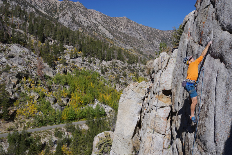 Tom hitting the crux move on the second ascent of Boogie with Xeno