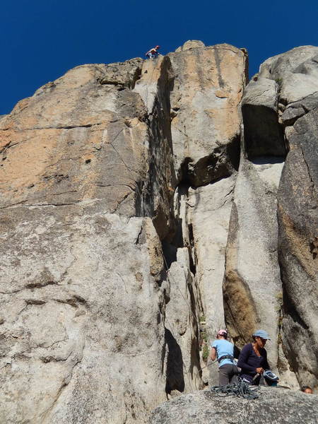 I am standing at the anchor of Ripper Arete. Don't get lured over to the left by the visible bolt and the easier climbing.