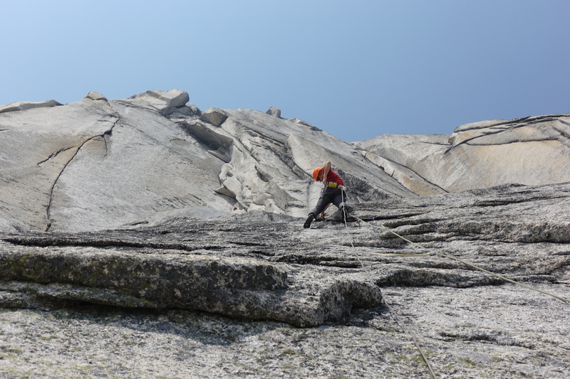 Joshua Lavigne starts up the layback on pitch 4 (5.10+) of Draco. Above and right is the golden corner of Draco, the finger crack to the left is a Josh L 12+ special!
