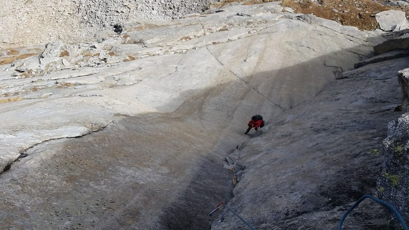 Looking down on Eye of Mordor pitch with scary 5.8 friction seam just below the climber in the photo.
