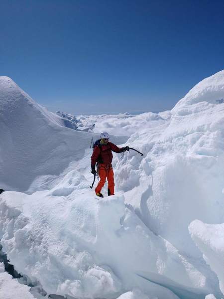 Last steps to the summit cap. Would have been tough to find without tracks