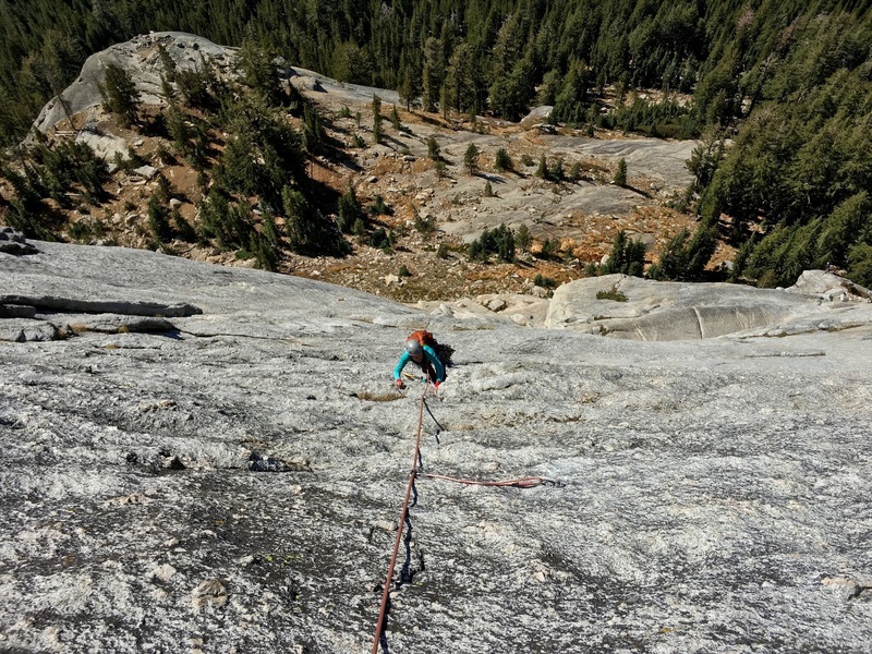 Giselle climbs up to the top of pitch 3. Very featured rock here.